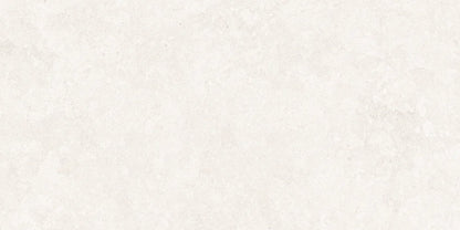 A close-up of a light warm off-white textured surface, resembling stone, concrete, or plaster.